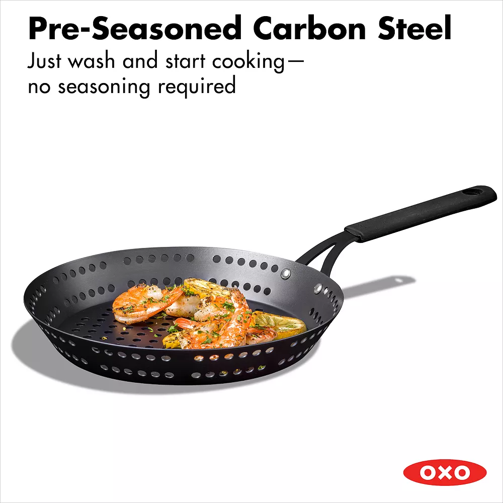 OXO Obsidian Pre-Seasoned Carbon Steel 12-in. Frypan With Holes For Grilling With Removable Silicone Handle Holder 4 OXO Obsidian Pre-Seasoned Carbon Steel 12-in. Frypan With Holes For Grilling With Removable Silicone Handle Holder - Image 2