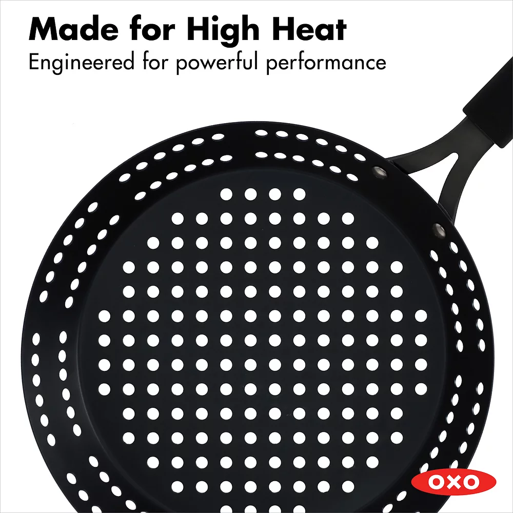 OXO Obsidian Pre-Seasoned Carbon Steel 12-in. Frypan With Holes For Grilling With Removable Silicone Handle Holder 8 OXO Obsidian Pre-Seasoned Carbon Steel 12-in. Frypan With Holes For Grilling With Removable Silicone Handle Holder - Image 6